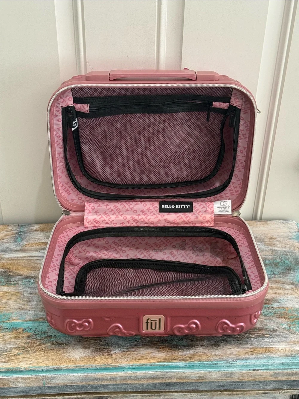 NWT FŪL Hello Kitty 13” Metallic Pink Hardshell Suitcase w/Logo Design